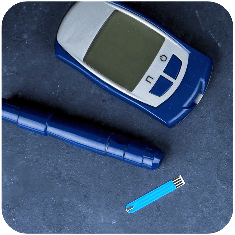 Glucometer, diabetes medication, and insulin syringe on dark background; Shutterstock ID 1087216982; Purchase Order: 18024947; Client/Licensee: Siri Vonessen